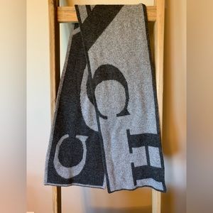 Coach scarf in gray and charcoal gray.